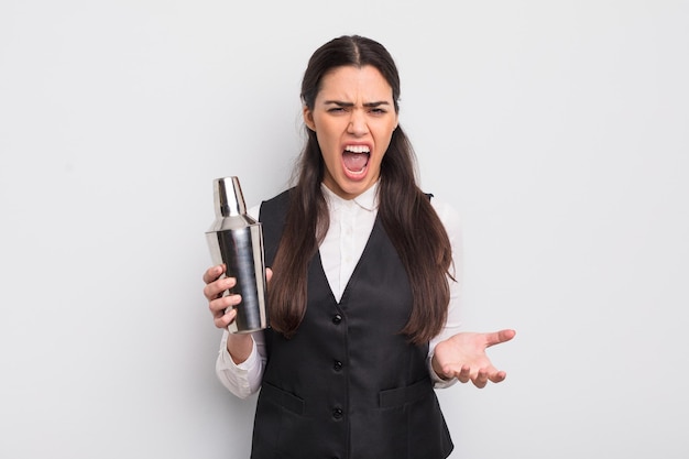 Pretty hispanic woman looking angry annoyed and frustrated barman cocktail concept