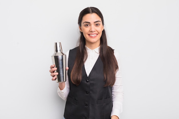 Pretty hispanic woman looking happy and pleasantly surprised barman cocktail concept