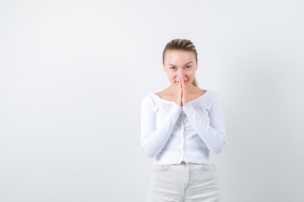 Pretty lady is asking for something on white background