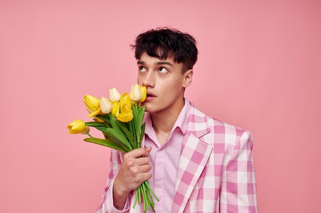 Pretty man fashionable pink sunglasses jacket posing pink background unaltered