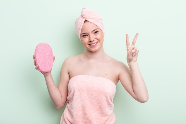 Pretty redhead woman having a shower concept