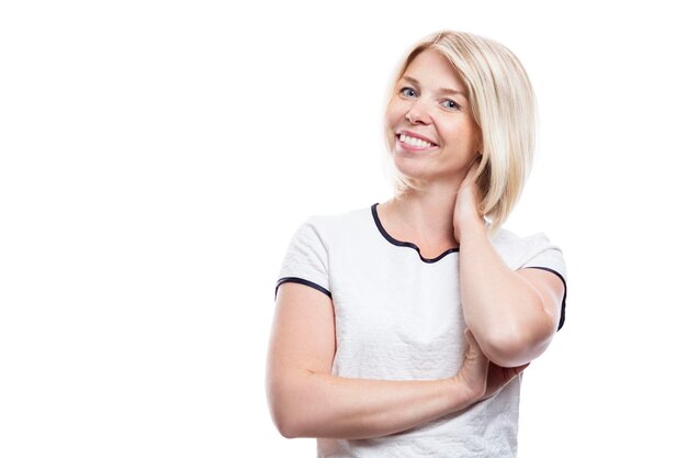 Pretty smiling woman Beautiful blonde in a white dress success and business Isolated on white background Space for text