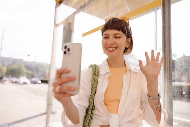 Pretty smiling woman having video call