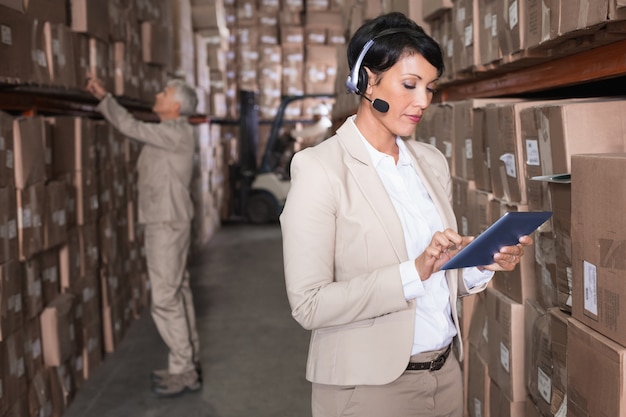 Pretty warehouse manager using tablet pc