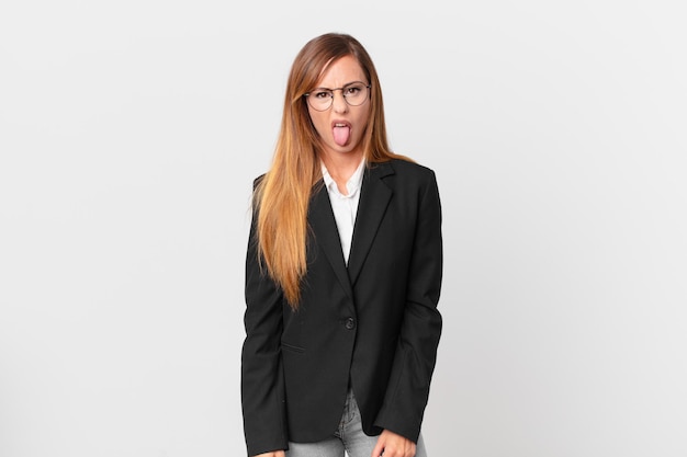 Pretty woman feeling disgusted and irritated and tongue out. business concept