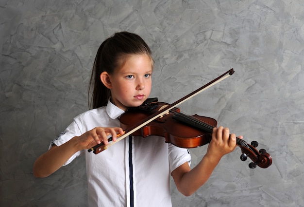 Pretty woman playing violin