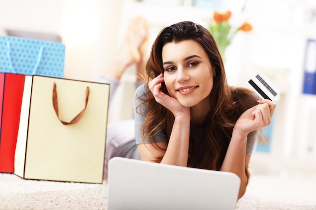 pretty woman shopping online with credit card