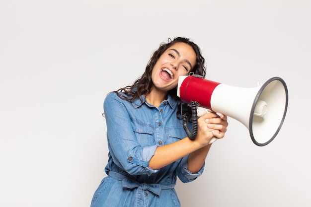 Pretty woman with a megaphone