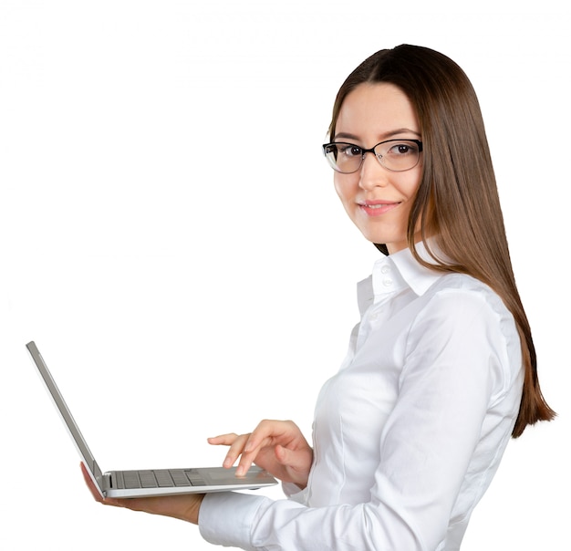 Pretty young businesswoman with laptop