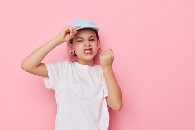 Pretty young girl posing white tshirt emotion isolated background