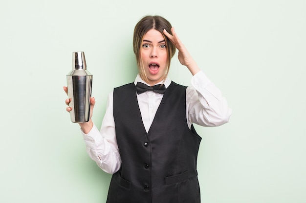 Pretty young woman looking happy astonished and surprised cocktail barman concept