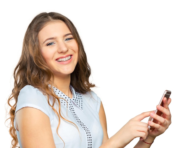 Pretty young woman using mobile phone