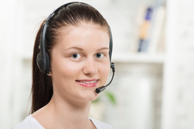 Pretty young woman with a headset