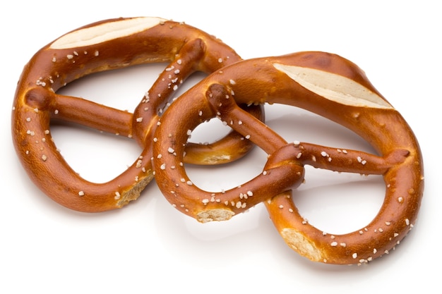 Pretzel isolated on white. Fresh fragrant brezel top view.