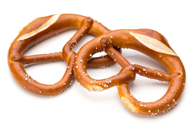 Pretzel isolated on white. Fresh fragrant brezel top view.