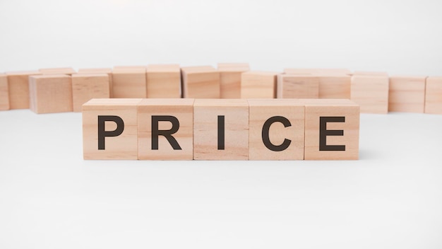 Price word, text, written on wooden cubes, building blocks, over white background