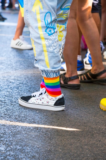 Pride fashion Pride and trouser design socks with arrow upwards Concept of personal growth freedom and rights Walking for rights