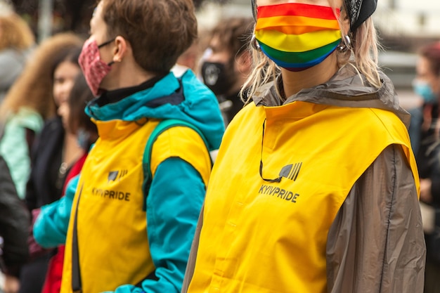 Pride Parade in Kyiv, Ukraine. Volunteers on the march help the participants. Concept LGBTQ.