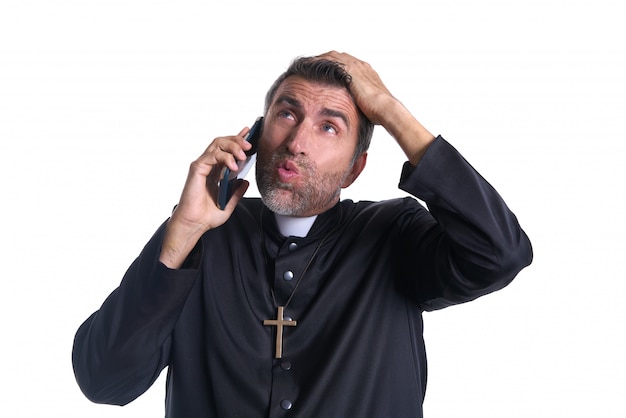 Priest talking smartphone funny expression