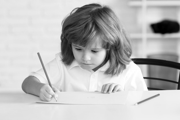 Primary school pupil school kid in classroom kid gets ready for school homework education learning