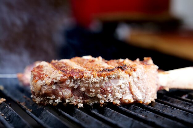 Prime rib on the parrilla at a Brazilian barbecue with coarse salt