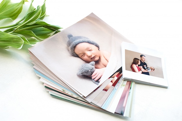 Printed photos of family with leaves