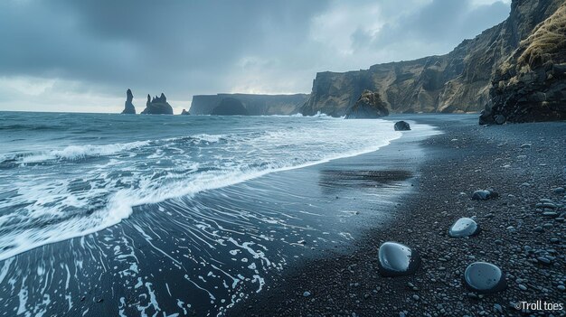 Photo pristine beach with black sand kissed by ocean waves