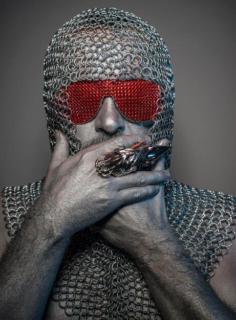 Privacy firewall, man with iron armor and red glasses, concept of protection and computer security