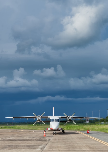 private jet in the airport on a cloudy day