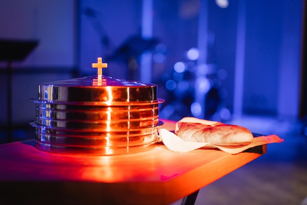 The process of breaking bread in the modern church Breaking bread ceremony in protestant church Religious tradition of breaking bread Bread and wine