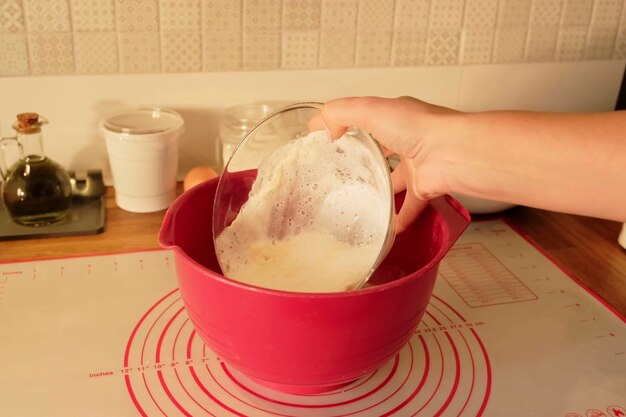 The process of making buns flour eggs chocolate tremble dough milk salt