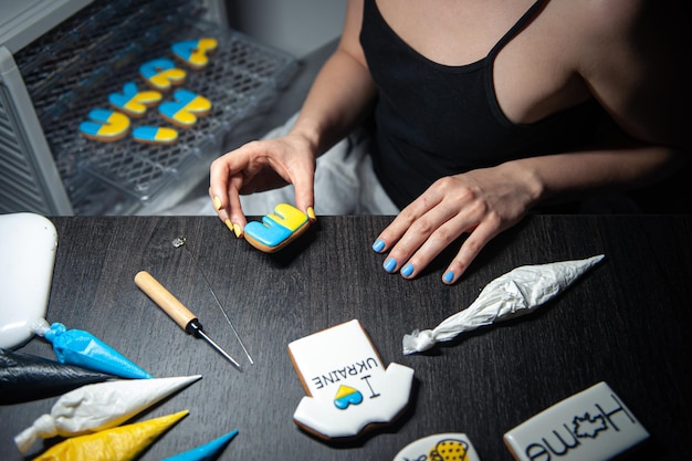 The process of making gingerbread in the form of the word ukraine