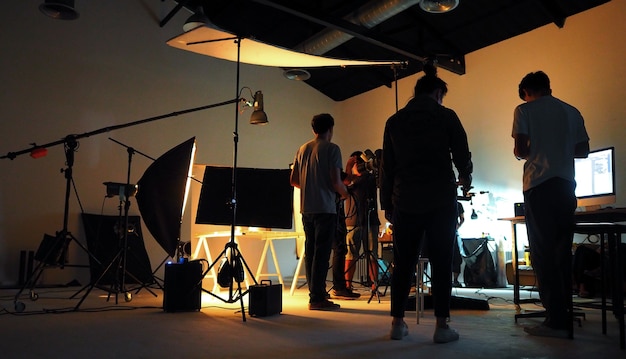 Production team shooting some video movie for tv commercial with studio equipment set.