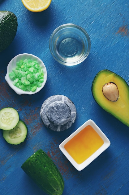 Products for a relaxing avocado spa treatment top view