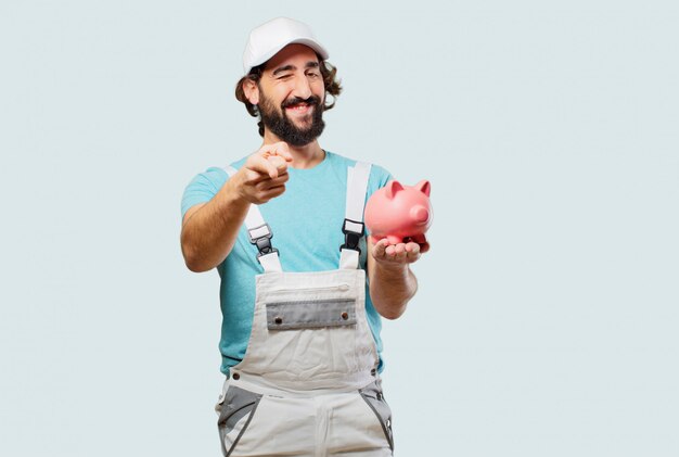 Profesional painter  with a piggy bank