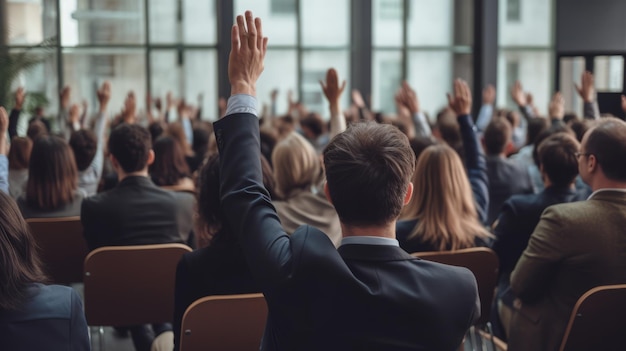 At a professional business seminar a diverse audience raises their hands in an important decision