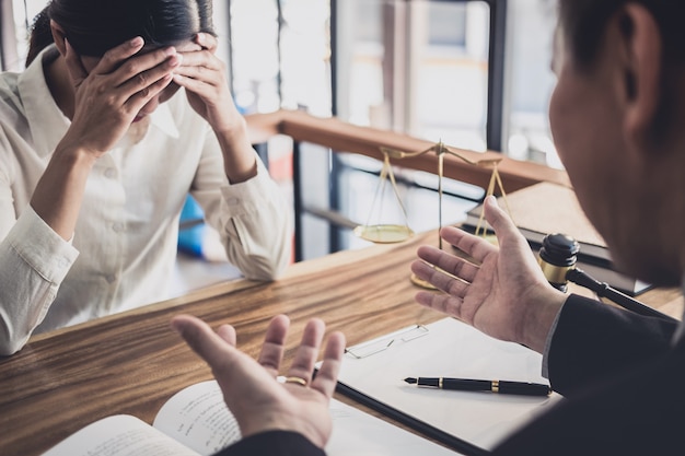 Professional businesswoman and Male lawyers working and discussion having at law firm