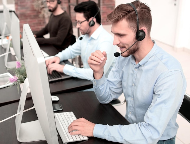 Professional call center operators communicate with customers