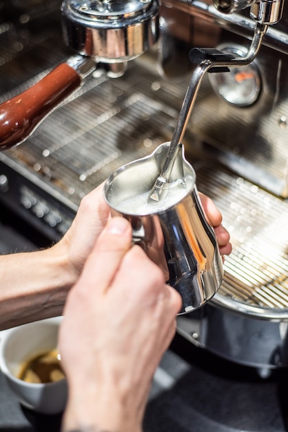 Professional coffee making in cafe