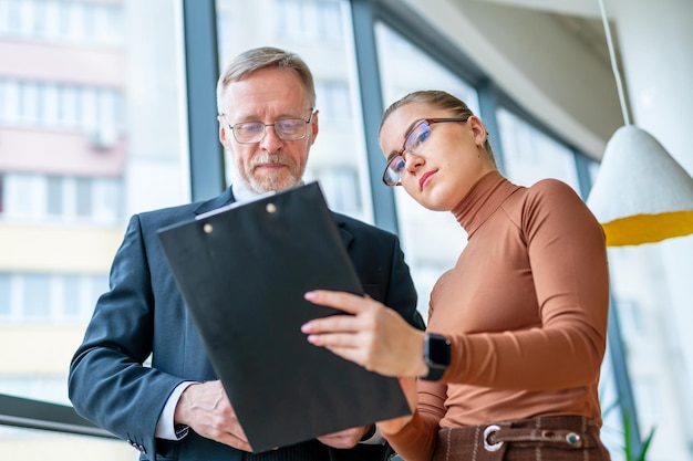 Professional confident colleagues Business managers working in modern office