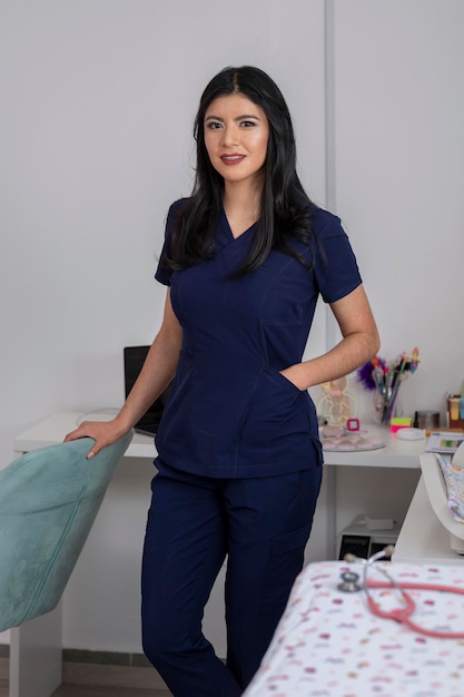 Professional doctor in her office leaning back in her desk chair looking at the camera