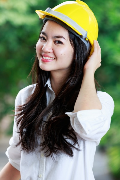 Professional engineer woman with hard hat