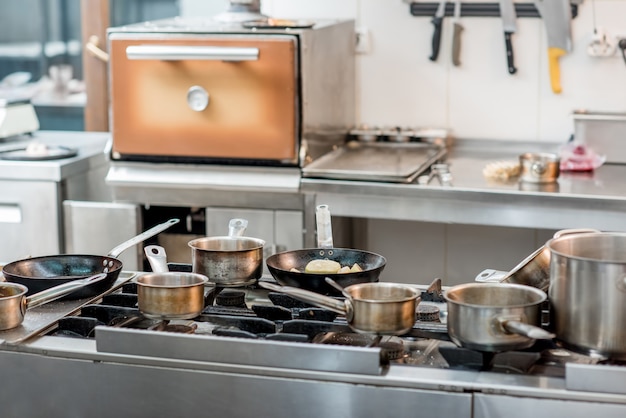 Professional equipped stove at the restaurant kitchen