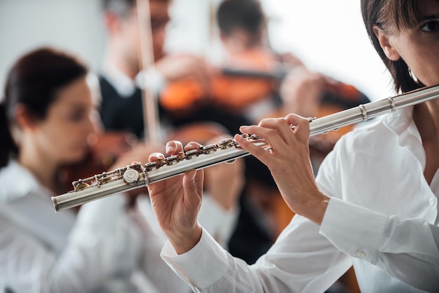 Professional flute player performing