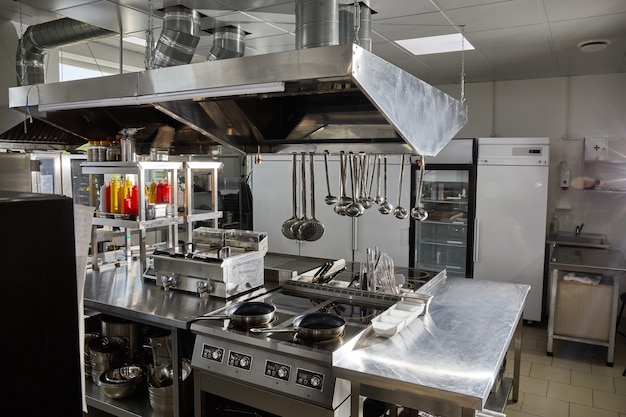 Professional kitchen in restaurant modern equipment and devices empty kitchen