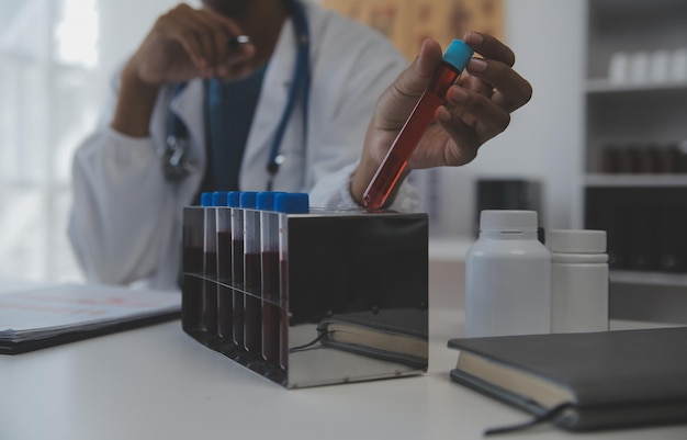 Professional lab Amazing longhaired medical worker wearing uniform while using microscope during research