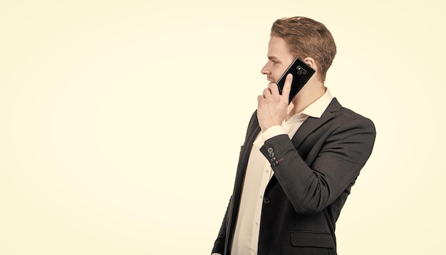 Professional man employee in formalwear talk on cellphone isolated on white copy space phone call