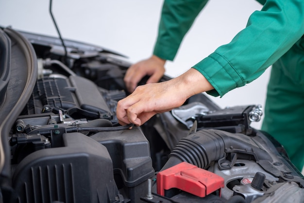 Professional mechanic hand providing car repair and maintenance service