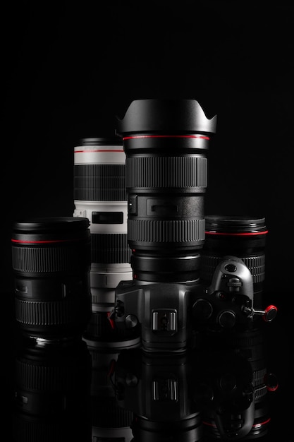 Professional mirrorless camera with premium lenses in dark background