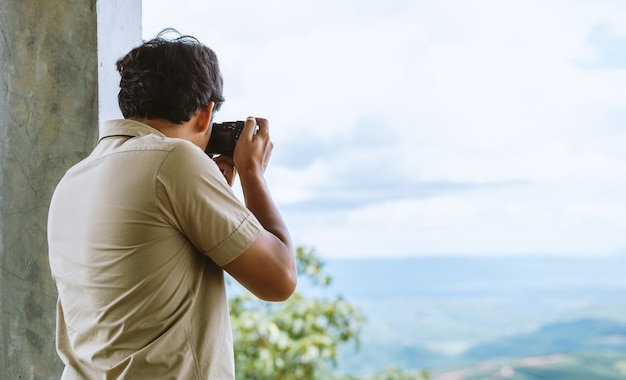 Professional photographer concentrate and continue his passion for photography 